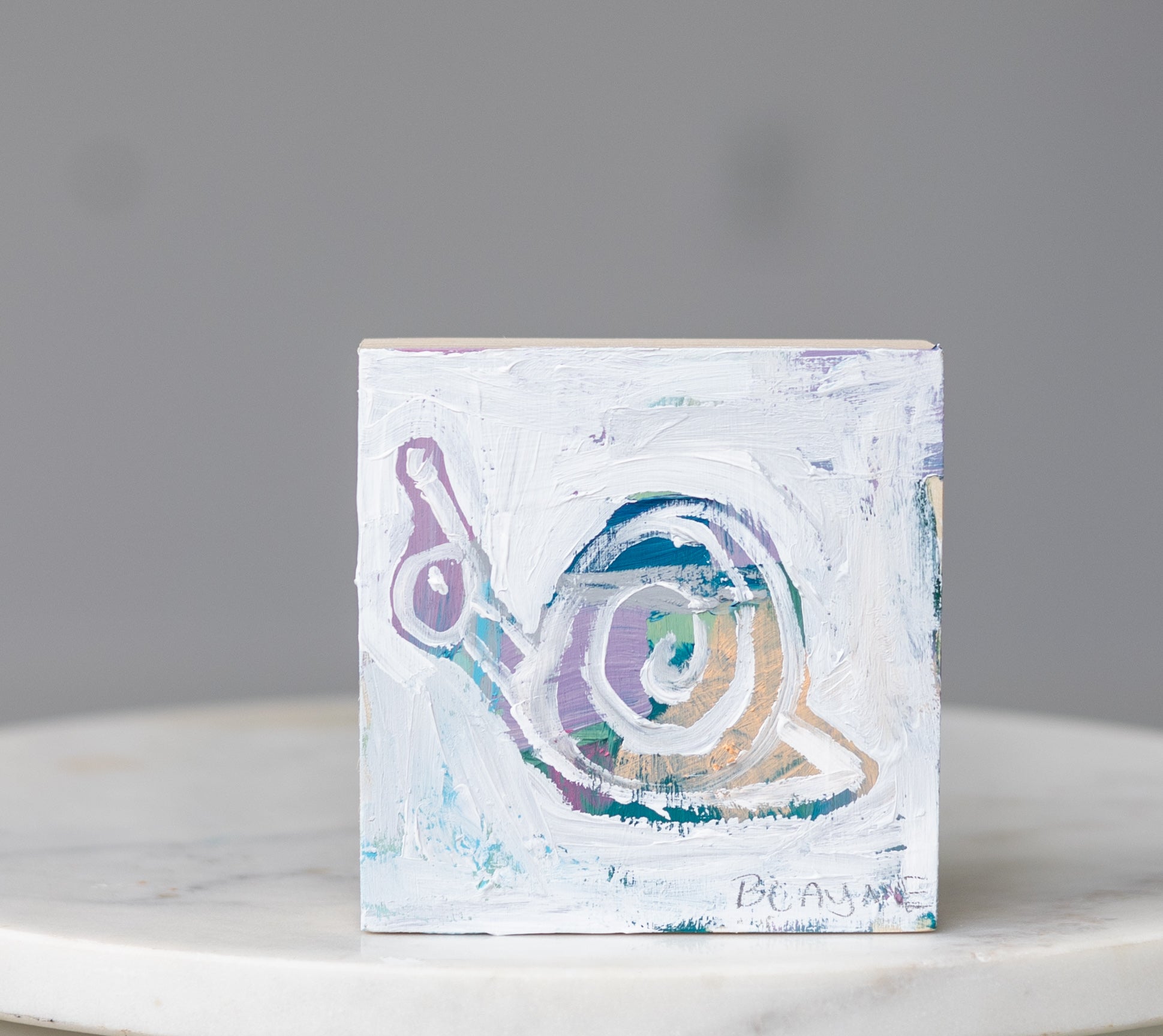 Snail painting on a wood canvas